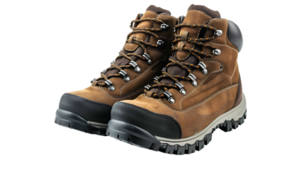 A pair of brown leather hiking boots with laces and a chunky sole on a solid color surface