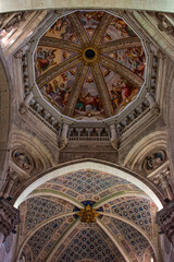 Italy, Europe: the stunning frescoed dome and ceiling decorations of the church of the Certosa di Pavia, (Pavia Charterhouse), famous monastery complex in Lombardy built from 1396 to 1495