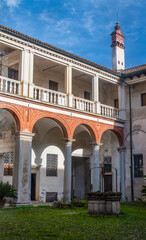 Obraz premium Italy, Europe: frescoed cloisters of the Clausura, the reserved area for cloistered monks in the Certosa di Pavia, monastery complex in Lombardy built from 1396 to 1495, seen from a window