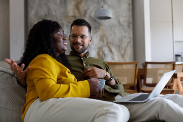 Fototapeta premium Couple planning vacation trip, searching places to visit