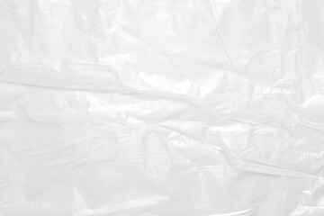 plastic overlay texture of realistic crumpled transparent plastic film wrap on black background,wrinkled stretched plastic effect.
