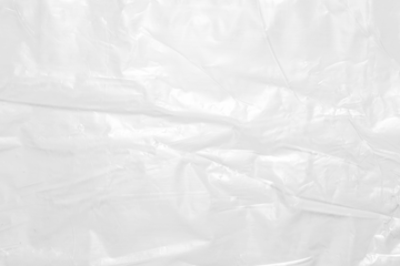 plastic overlay texture of realistic crumpled transparent plastic film wrap on black background,wrinkled stretched plastic effect.