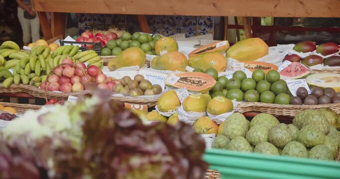 Exotic fruits on display at Lavradores Market, Funchal, Madeira Island, Portugal, vibrant scene