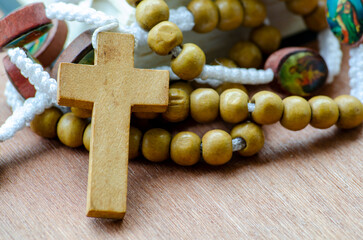 Traditional Rosary Featuring Wooden Cross and Beads