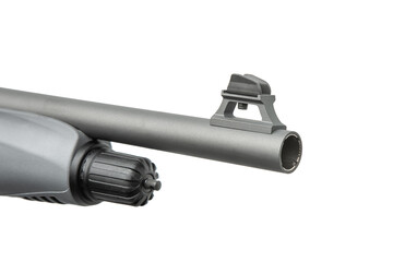 A close-up view of the muzzle and front sight of a gray shotgun barrel, with a portion of the forend visible on the left, all isolated on a white back