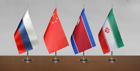 Flags of Russia, China, South Korea and Iran on a gray background