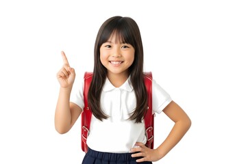 笑顔で指差す小学生の女の子