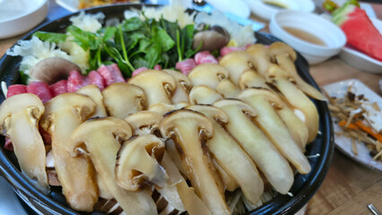 Korean Hot Pot with Raw Beef, Mushrooms, and Vegetables