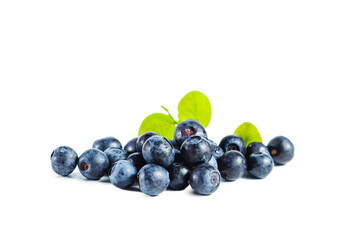 Ripe fresh blueberries with leaves isolated on white.