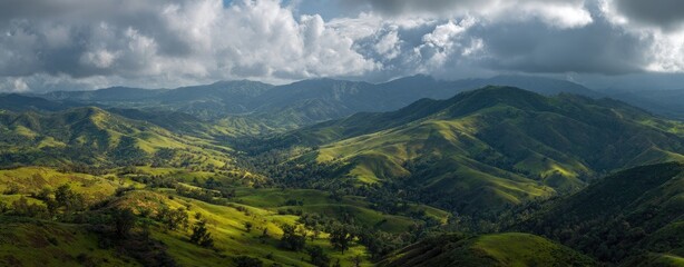 Panoramic mountain landscape with lush green valleys