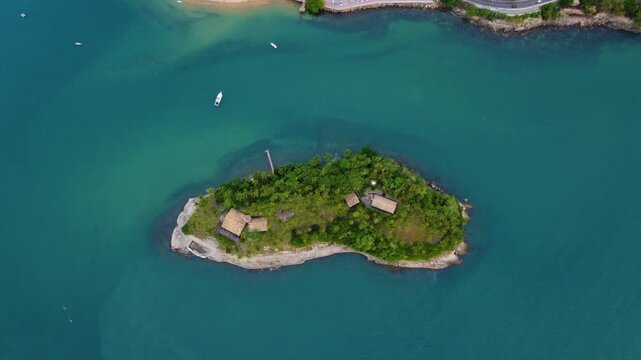 Ilha das cabras in Ilhabela, Brazil. Going around this little island during sunset, taken with my drone.
