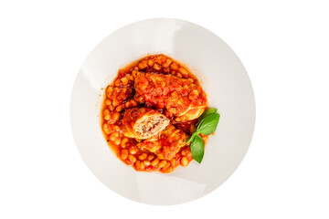 Stuffed cabbage tomato sauce with beans meat, cabbage, fresh delicious gourmet food background on the table rustic food top view copy space