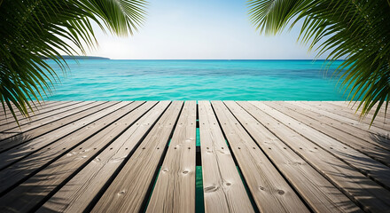 Fototapeta premium Wooden dock overlooking the turquoise ocean and blue sky on a sunny day