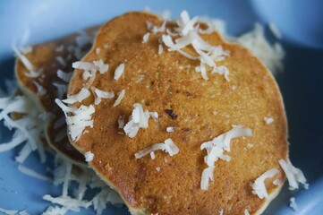 Banana pan cake with cheese sprinkled on top