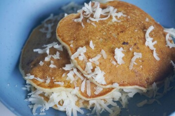 Banana pan cake with cheese sprinkled on top