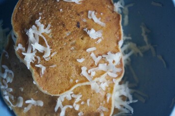 Banana pan cake with cheese sprinkled on top