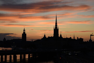 Naklejka premium Stockholm skyline with Riddarholmen and City Hall at sunset