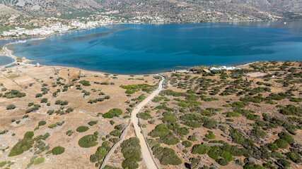 panoramic drone view of coastal sea water and rocky shore near Crete island