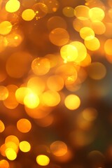Obraz premium Warm abstract bokeh of yellow and orange lights creating a dreamy blurred background effect