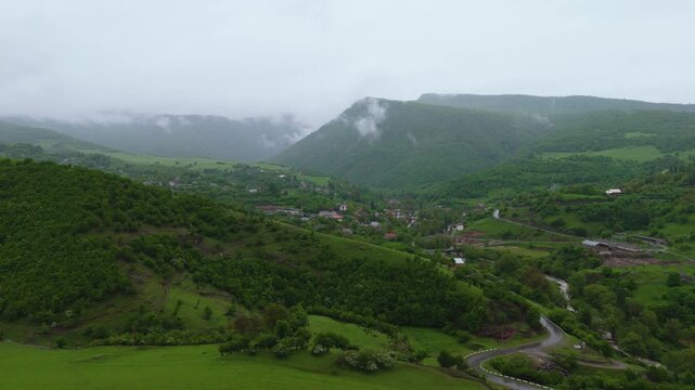 Aerial view Lori province, Armenia, Caucasus. Drone fly over green landscape in Lori province. Ideal for themes of nature, travel, the Caucasus region, and untouched wilderness.