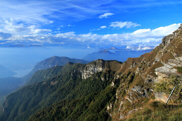 Naklejka premium Monte Generoso with lake Lugano, Lugano and the Swiss Alps in the background, northern Italy on the border to Switzerland