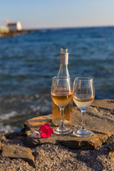 Wine on the seashore. Selective focus.