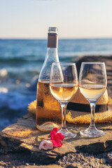 Wine on the seashore. Selective focus.