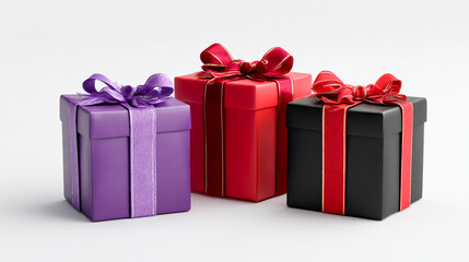 Obraz premium 3 wrapped gift boxes, one in purple with ribbon and bow, the second is red, the third is black, isolated on a pure white background