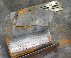 Sheet metal after laser cleaning of rust. A piece of metal after laser cleaning