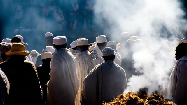 Religious ceremony with smoke and people in traditional clothing.