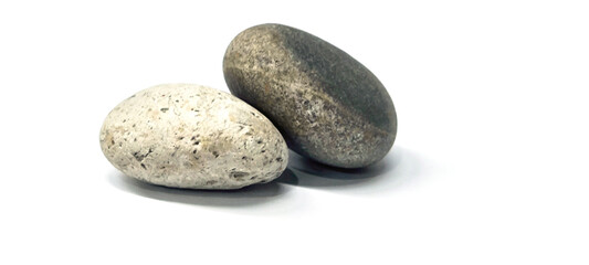 Natural river stones on white background