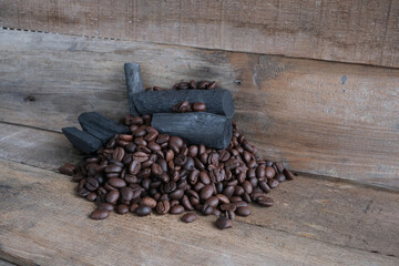 Coffee beans on a wooden background
