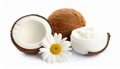 Flat-lay composition featuring a whole coconut, a halved coconut with exposed white flesh, a white jar of coconut cream or oil, and a delicate white daisy flower—arranged on a pristine white surface t