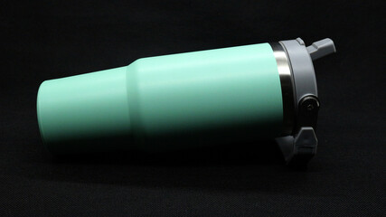 Mint green stainless steel tumbler isolated