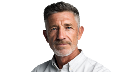 Gray haired man smiles confidently on a clear background