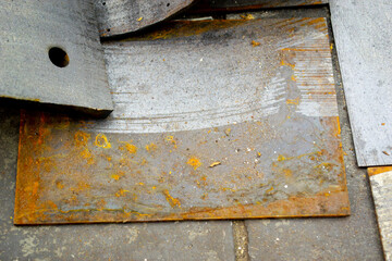Sheet metal after laser cleaning of rust. A piece of metal after laser cleaning