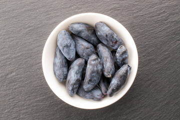 Sweet honeysuckle berries, top view, macro.