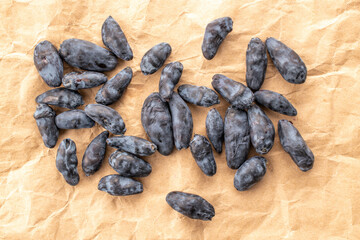 Obraz premium Sweet honeysuckle berries, top view, macro.