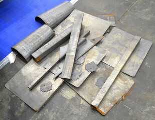Sheet metal after laser cleaning of rust. A piece of metal after laser cleaning