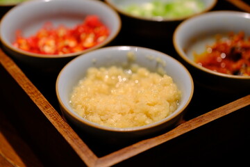 a bowl of minced garlic