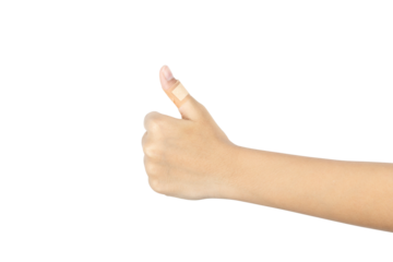 Thumbs up hand gesture with a bandage on the finger. Recovery and approval concept after an injury, isolated on white background with clipping path.
