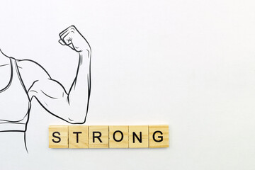 Drawing of a girl's biceps with the word strong. Space for text.