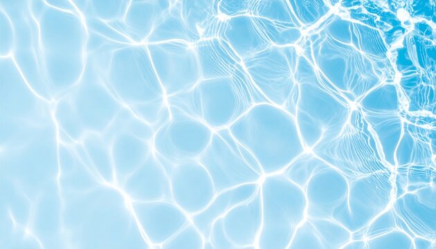 Clear blue water with light reflections creating a shimmering pattern on the surface.