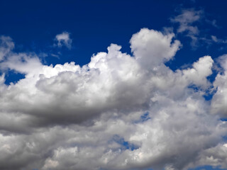 Beautiful cloud formation against a bright blue sky during the afternoon