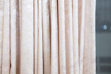 Pink curtains on window decoration in the home