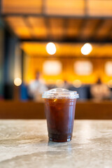 A glass of black iced or americano coffee, refreshing drink