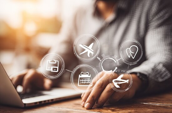 Person using laptop, travel icons overlay