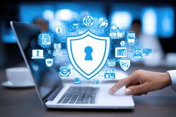 Laptop with security shield graphic overlay