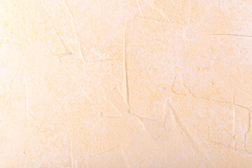 Light peach textured background surface for skincare, wedding or food presentation concept