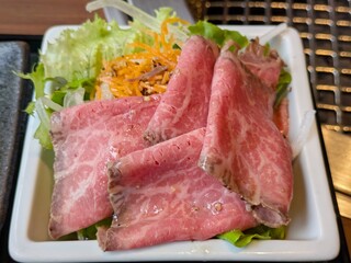 Colorful salad of marbled wagyu roast beef from a high-end yakiniku restaurant